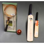 A miniature 1999 World Cricket bat signe