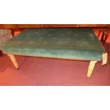 A 20th century hearth stool upholstered