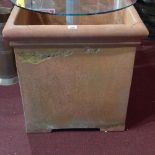 A large pair of terracotta planters of s