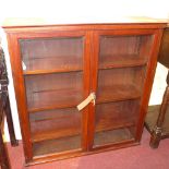 A Victorian mahogany hanging bookcase fi