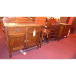 A 1940's oak chest fitted two short and