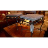 A pair of wrought iron footstool upholst