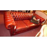 A Chesterfield three seater sofa upholst