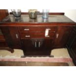 An Art Deco design teak sideboard, havin