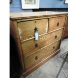 An Edwardian pitch pine chest of two sho