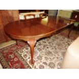 A Queen Anne design walnut dining table,