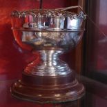 A Mappin and Webb hallmarked silver rose bowl on mahogany stand 17cm tall