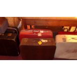 An extensive collection of vintage luggage cases of various ages,