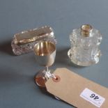 A silver miniature cup together with a silver collared perfume bottle and a silver lidded glass pin