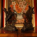 A pair of Victorian spelter figures of warriors on horseback,