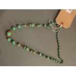 A Jadeite beaded necklace of graduated s