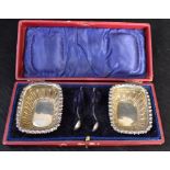 Pair of salt cellars in case with spoons DC241