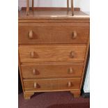An Art Deco oak chest fitted four drawer