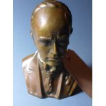 A bronze bust of a gentleman