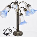 A Tiffany Style Lamp With Six Blue & White Shades