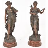 A pair of late 20th Century bronze female figures