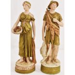 A pair of Royal Dux peasant worker figures