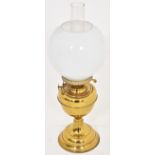 A Victorian brass oil lamp