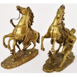 A pair of late 19th Century gilt brass horses