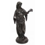 A late 19th Century bronze female musician
