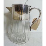 A vintage French lemonade glass jug, having silver plate top and handle