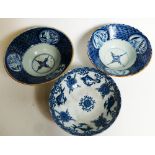 A pair of 19th Century blue and white Japanese bowls along with one similar (3)