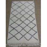 A genuine vintage Berber (Beni Ourain) runner, the all over geometric lozenge design on a thick