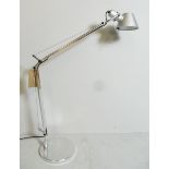 A contemporary anglepoise desk lamp