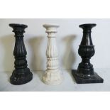 A set of three various classical marble pedestal columns, having carved acanthus leaf decoration