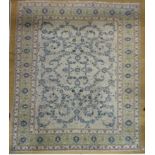 A fine Isfahan design carpet, the all over typical vine and palmette design on an aqua ground within