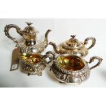 A fine quality silver 19th Century four piece silver set finely cast with floral finials