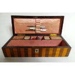 An early 19th Century domed top sewing box complete with fittings