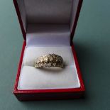 A 9ct gold ring inset with diamonds