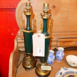 A pair of gilt metal and green painted t