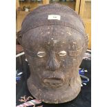 A vintage carved wood African tribal model of a head, possible Yorubu (AF)