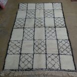 A genuien vintage Berber (Beni Ourain) rug, the unique geometric chequered design on a thick ivory