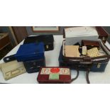 A quantity of vintage luggage, cased trumpet and cased typewriters