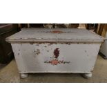 A Continental painted trunk with handpainted floral decoration