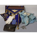 A MASONIC 'WORCESTERSHIRE' APRON CUFFS AND SASH, in leather case, along with another Masonic apron e