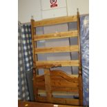 A HONEY PINE SINGLE BED FRAME