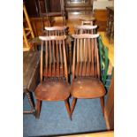 A SET OF FOUR ERCOL DINING CHAIRS