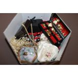 A BOX OF COSTUME JEWELLERY