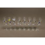 A SET OF EIGHT MURANO STYLE 'MILLEFIORI' CHAMPAGNE FLUTES