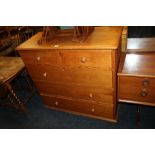 AN ANTIQUE PINE TWO OVER THREE CHEST OF DRAWERS