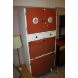 A RETRO VINTAGE KITCHEN CUPBOARD WITH DROP DOWN ENAMEL FRONT