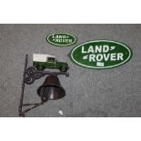 *A CAST LANDROVER BELL BRACKET + TWO LANDROVER PLAQUES  (3)