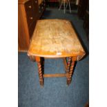 AN OAK BARLEYTWIST DROPLEAF TABLE + A REFECTORY STYLE TABLE  (2)