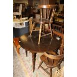 A CIRCULAR DINING TABLE + FOUR CHAIRS