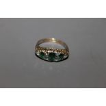 A VICTORIAN 9CT GOLD RING SET WITH GREEN STONES, APPROX WEIGHT 2.08g