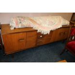 A RETRO LONG TEAK SIDEBOARD